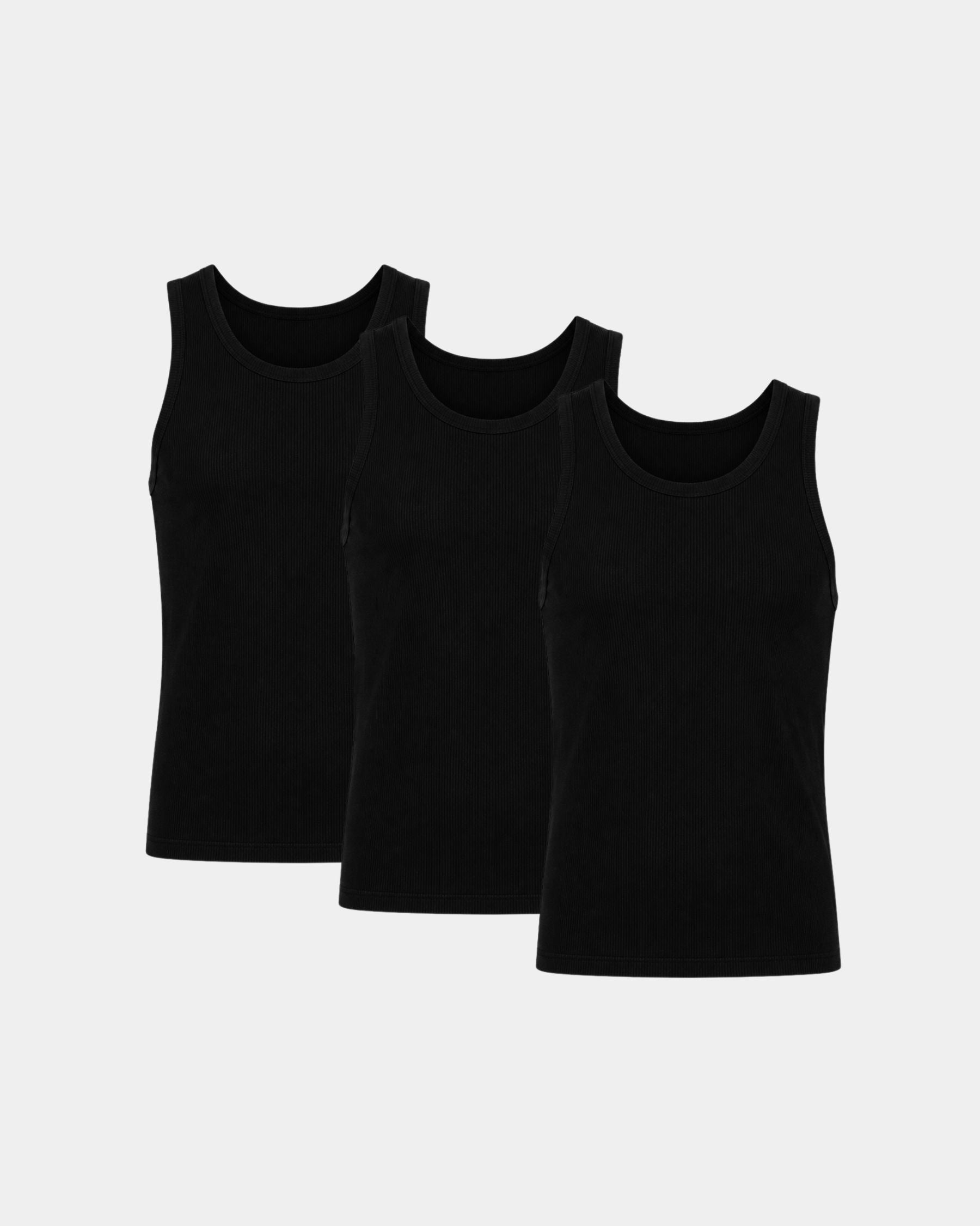 Three black ribbed tank tops arranged in a staggered overlapping layout on a light gray background.