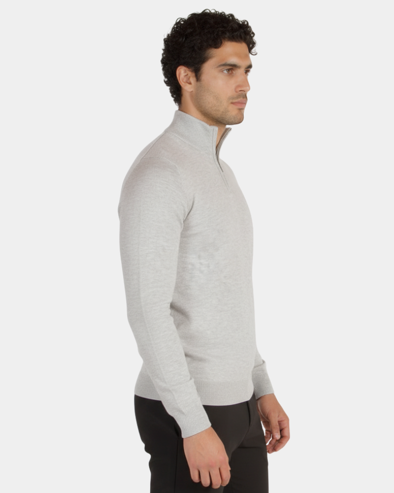 Minimalist luxury light grey wool knit half-zip sweater in a slim fit, featuring a ribbed collar and refined texture.