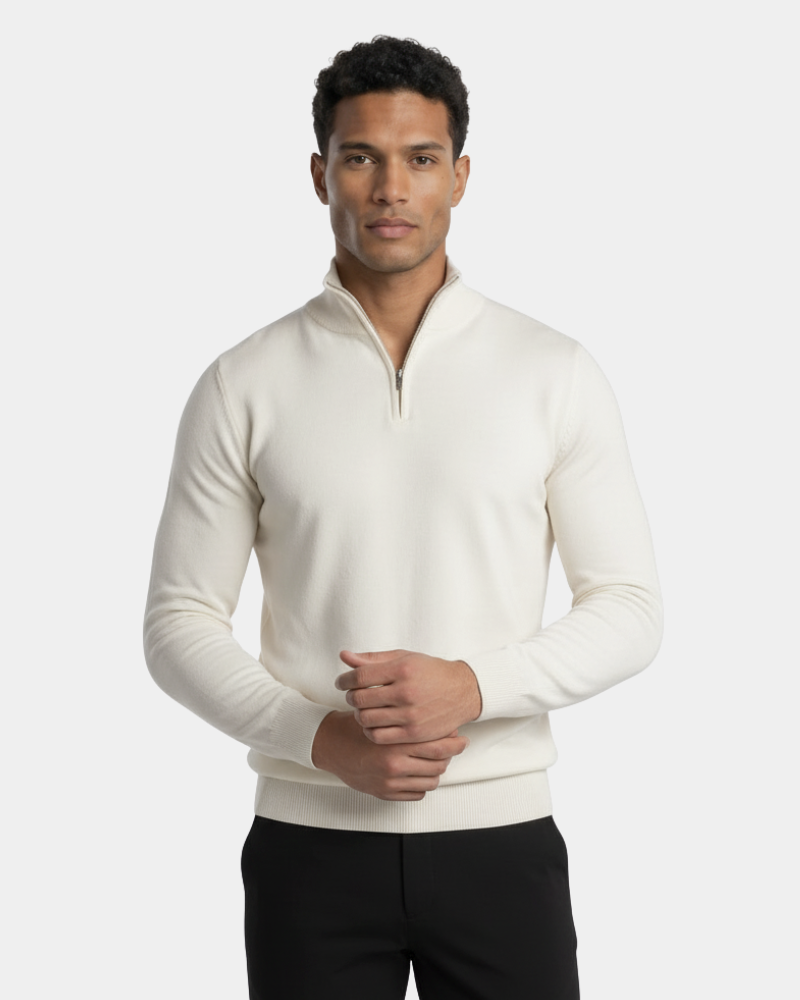 Minimalist luxury off-white cashmere knit sweater. Slim fit half-zip design with ribbed cuffs and a premium texture.