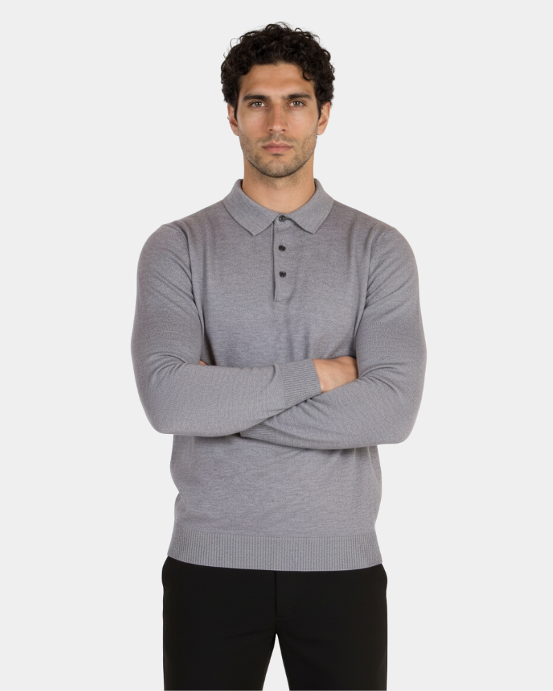 Minimalist luxury grey knit polo in fine-gauge merino wool. Slim fit with folded arms and a refined button collar.