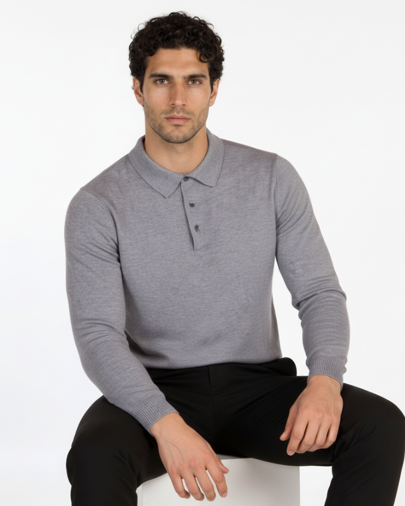 Luxury grey merino wool knit polo in a minimalist slim fit. Features a soft heathered texture and premium button collar.