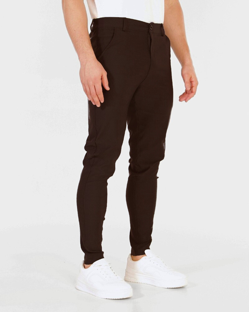 Minimalist luxury chocolate brown stretch cotton chinos in a slim fit, featuring a smooth, breathable matte texture.