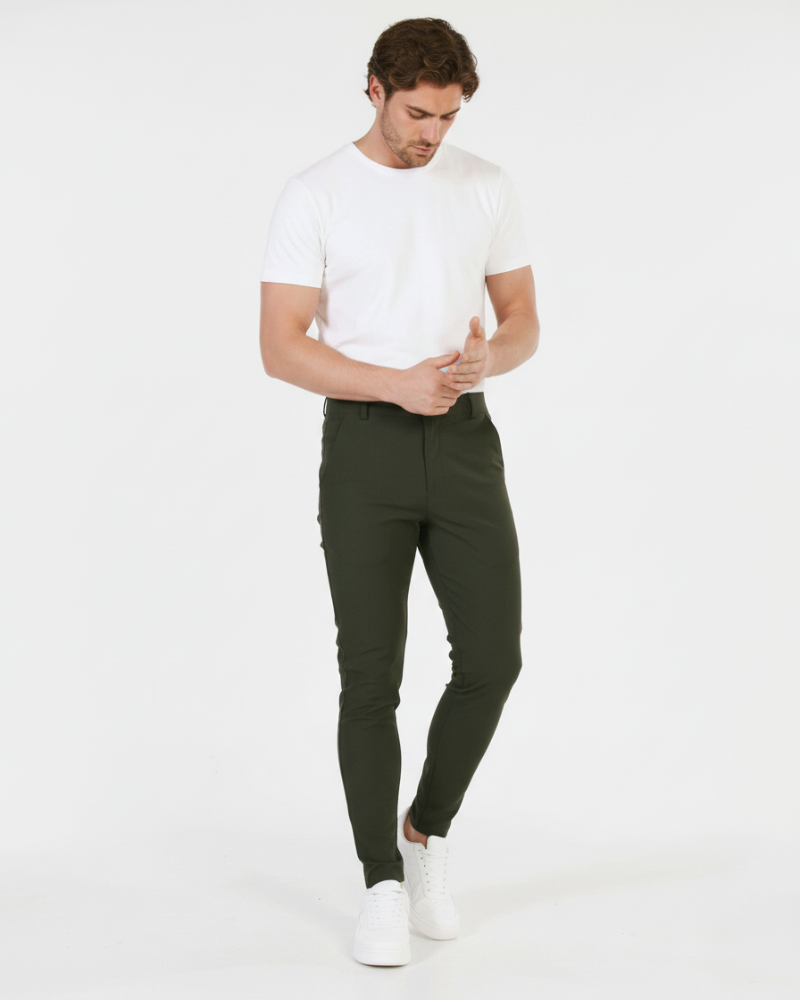 Minimalist luxury olive chinos in slim-fit stretch cotton-twill; tailored fit for a premium professional look.
