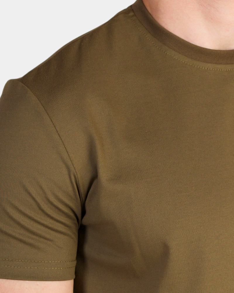 Detailed texture shot of olive luxury pima cotton Smart Fit T-shirt showing the refined mercerized fabric grain.