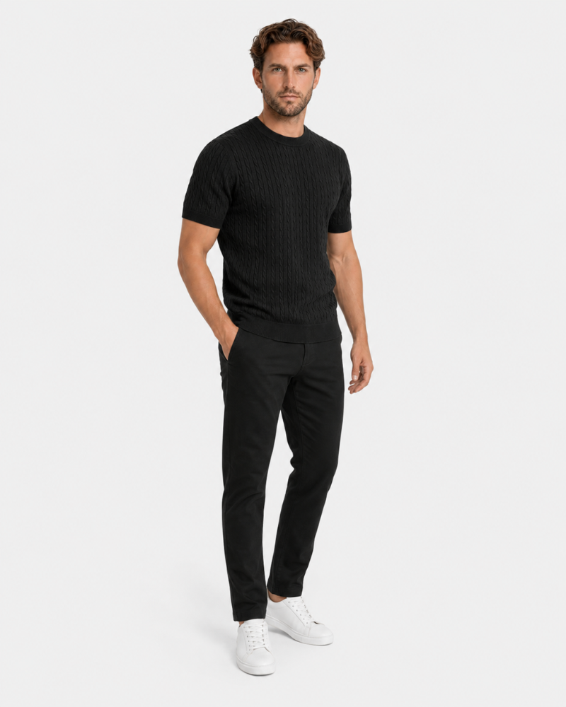 Man wearing a By Alden black t-shirt and black pants on a white background #color_black