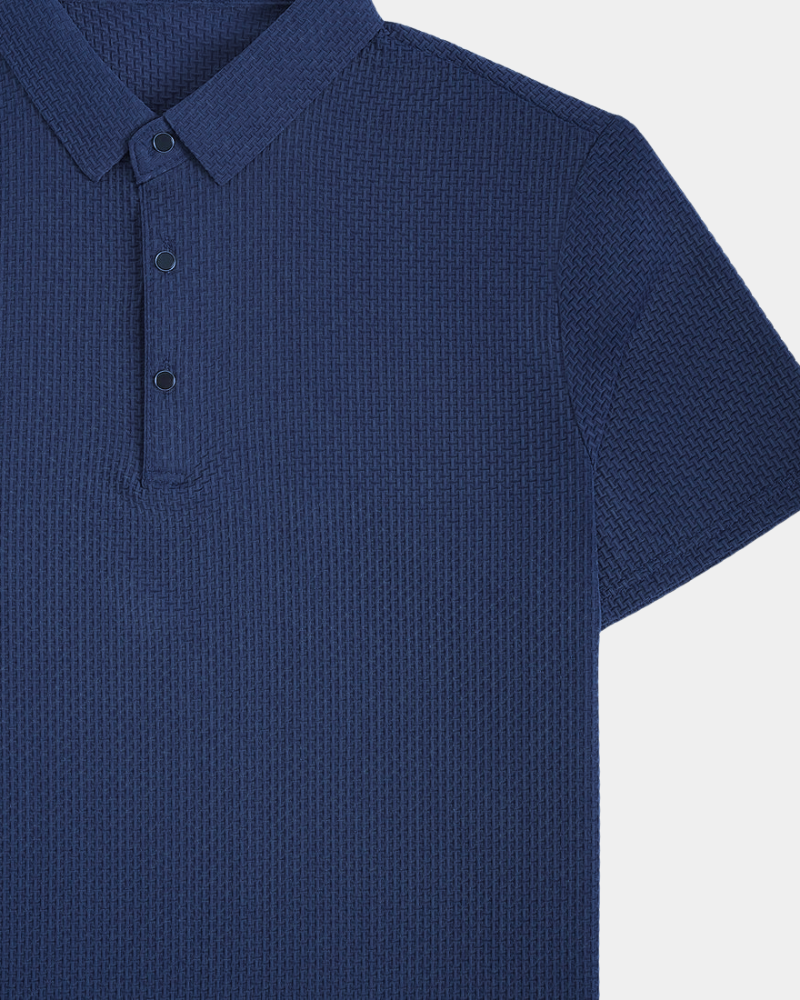 By Alden Navy blue textured polo shirt on a light gray background #Color_blue