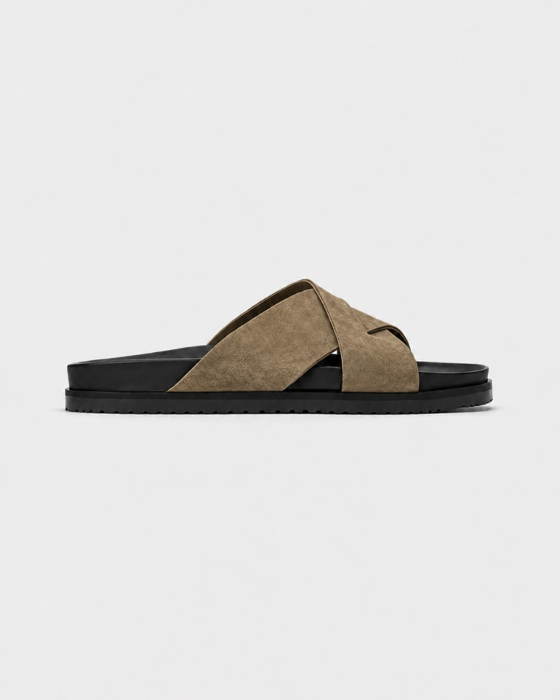 By Alden camel cross-strap suede slide sandal, black sole, side view, gray background #Color_camel