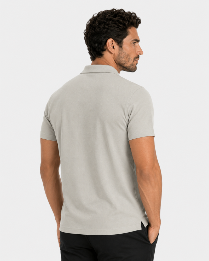 By Alden light gray knit polo shirt on male model, back view, upper body, light gray background. #color_deep stone