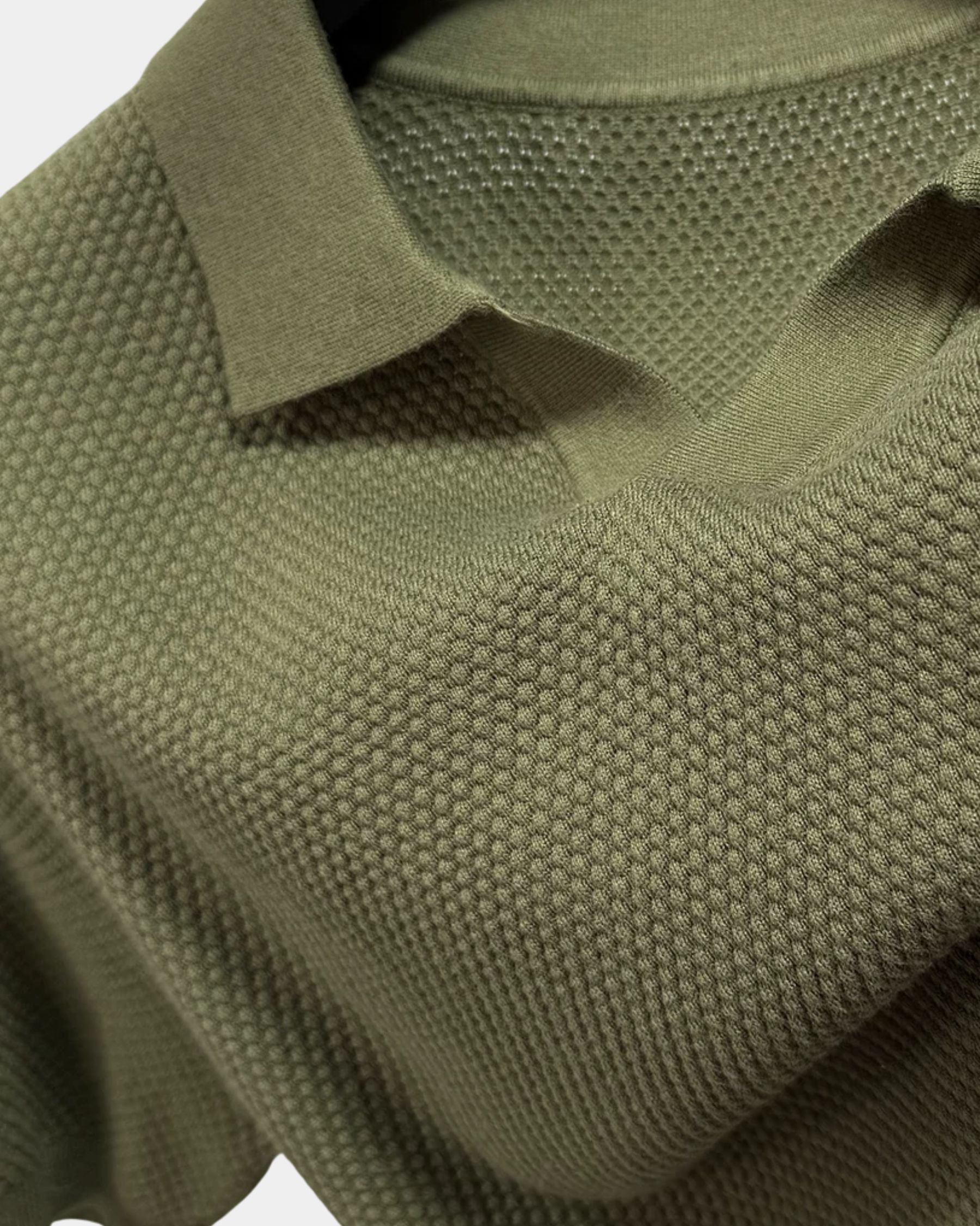By Alden olive green open-collar knit polo shirt collar and fabric texture detail, product shot, close-up, olive background. #Color_olive green