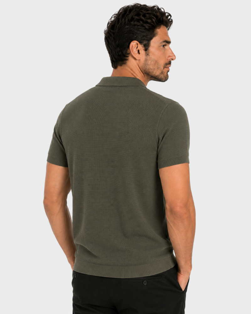 By Alden olive green open-collar knit polo shirt on male model, back view, upper body, light gray background. #color_olive green