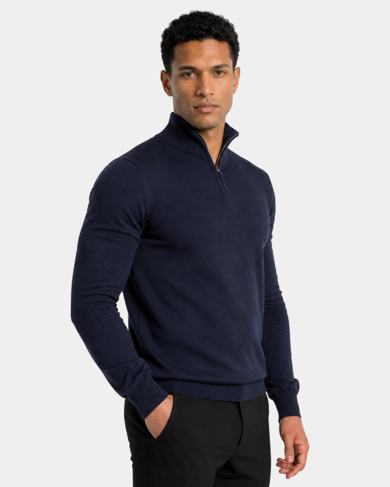 Man wearing a By Alden navy quarter-zip sweater on a light gray background #color_navy