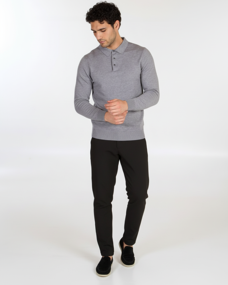 Full view of luxury grey merino wool knit polo. Minimalist slim fit with a refined drape and soft heathered texture.