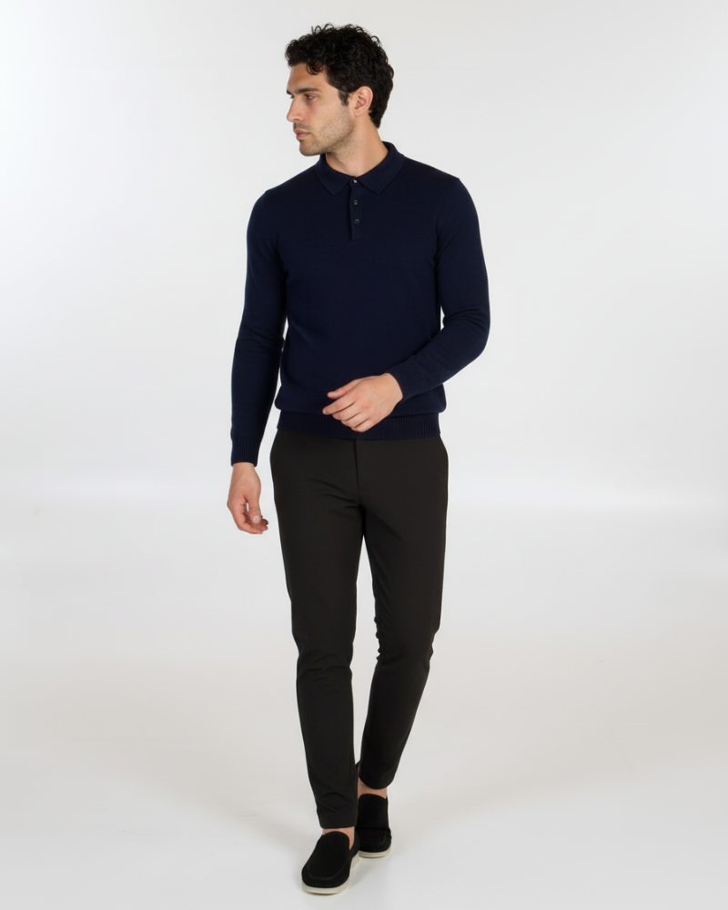 Luxury navy merino wool knit polo in a minimalist slim fit. Features a refined collar and premium texture.