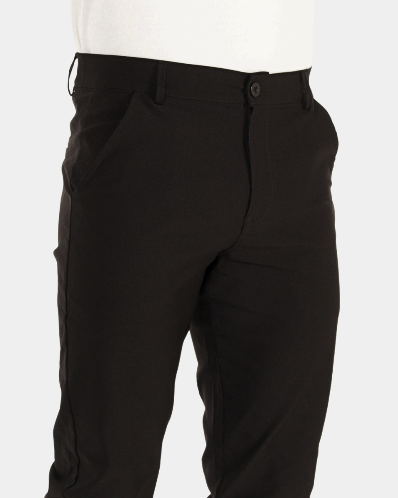 Close-up of luxury black stretch cotton fabric, highlighting the minimalist waistband and premium texture.