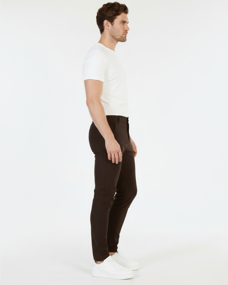 Minimalist luxury brown stretch cotton chinos featuring a tailored slim fit and smooth, premium matte finish.