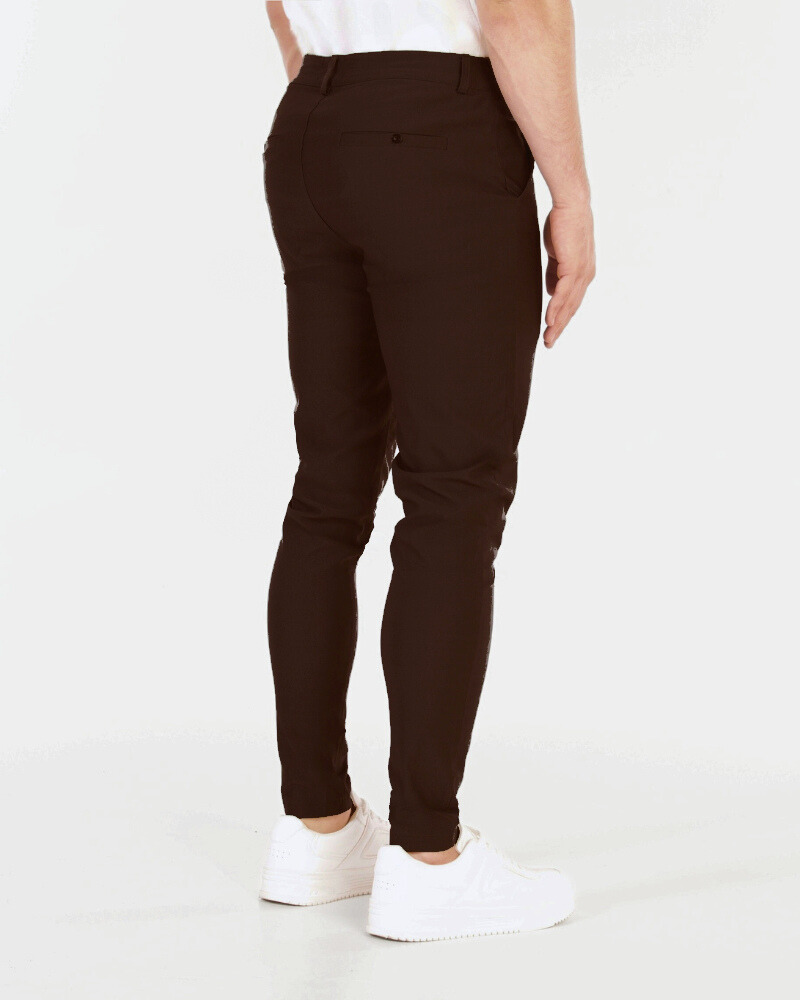 Minimalist luxury chocolate brown chinos in a slim-fit stretch cotton blend, featuring a tailored, lightweight texture.