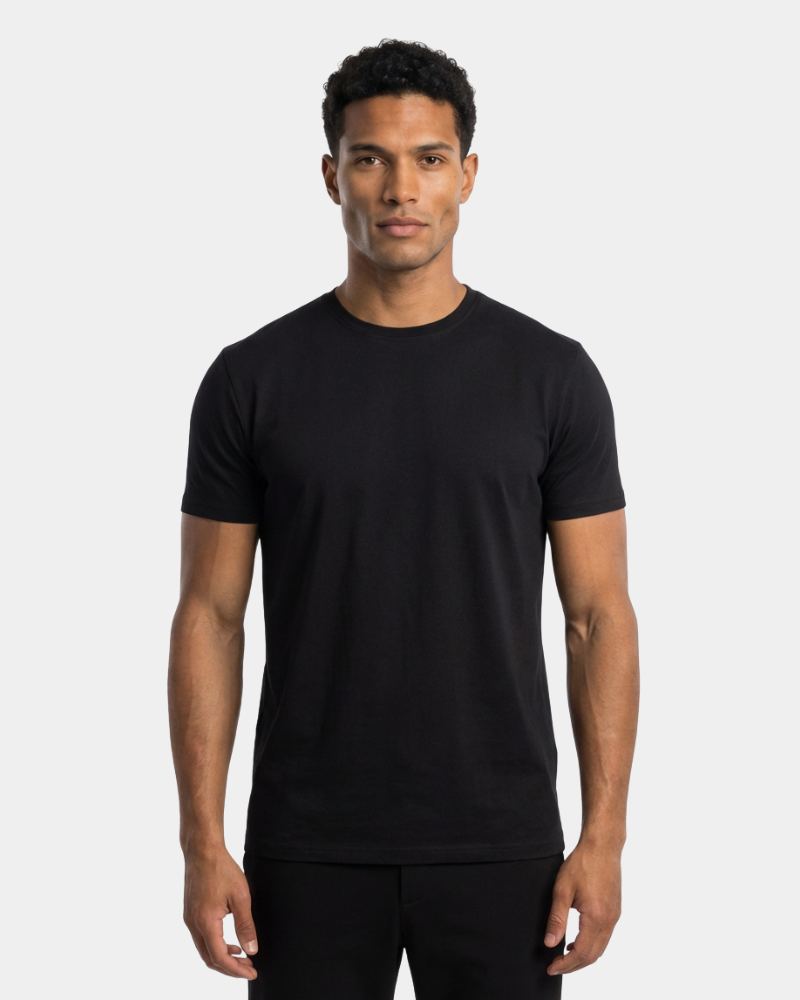 Minimalist luxury black t-shirt in premium pima cotton featuring a tailored smart fit on a male model.