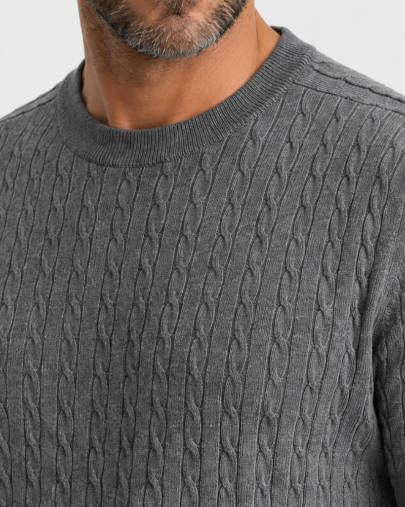 Close-up of a By Alden gray cable knit sweater on a person #color_gray