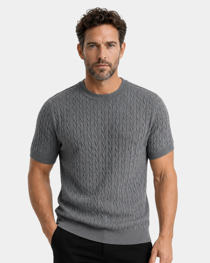 Man wearing a By Alden gray cable knit sweater on a light gray background #color_gray