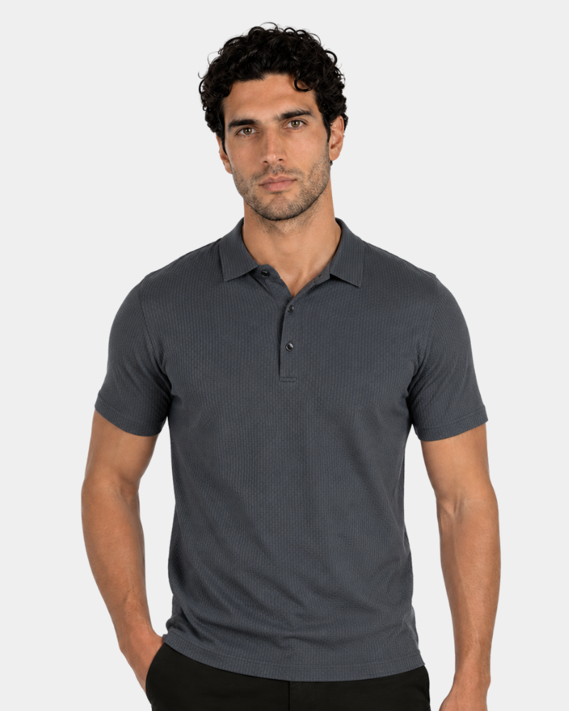 Man wearing a By Alden gray polo shirt against a white background #Color_dark gray