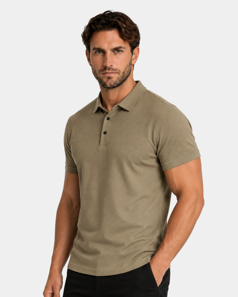 Man wearing a By Alden green polo shirt against a white background #Color_camel
