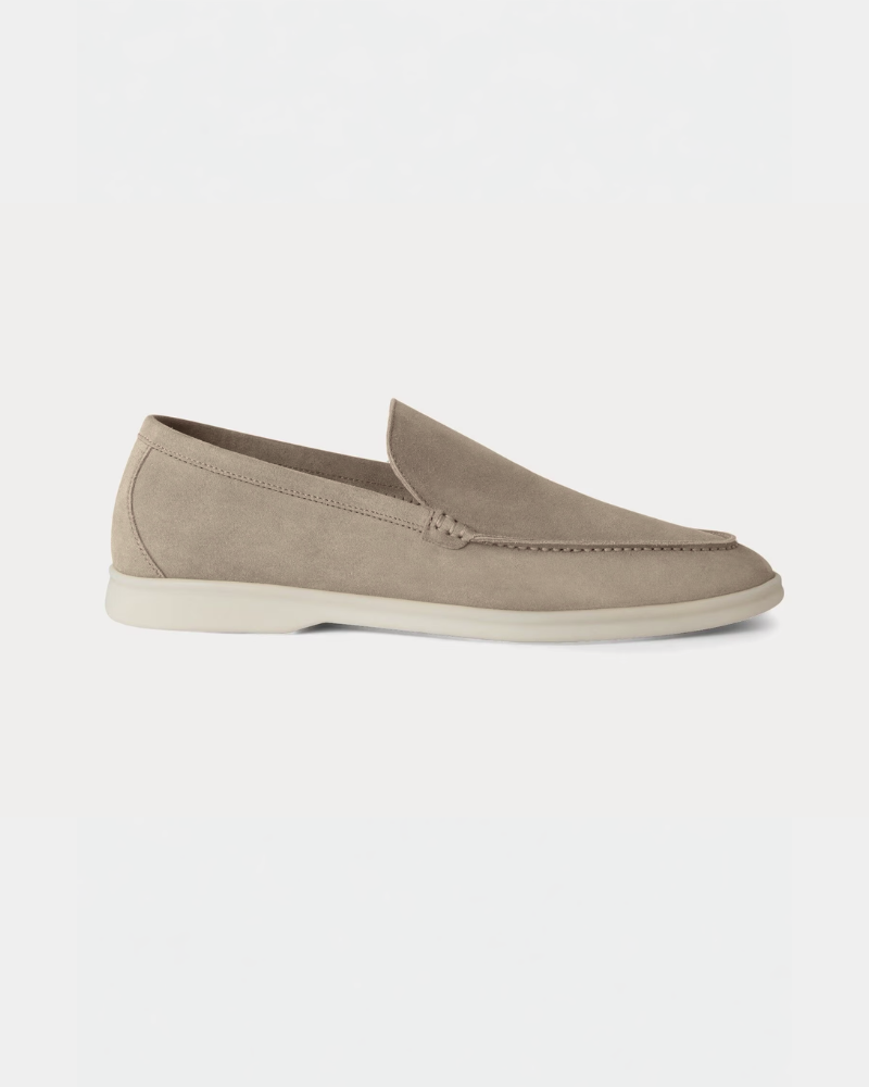 By Alden Minimalist luxury stone suede loafers with off-white rubber soles, featuring a clean slip-on fit and premium texture. #color_stone