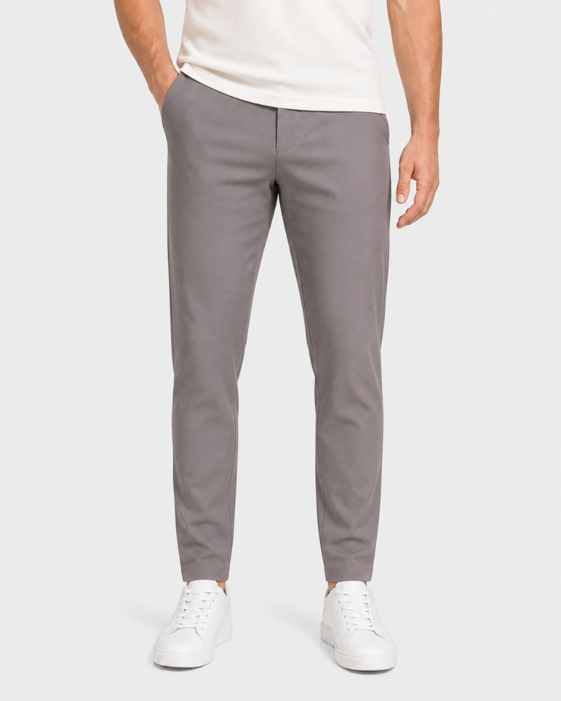 Person wearing By Alden gray pants and white sneakers on a white background #Color_gray