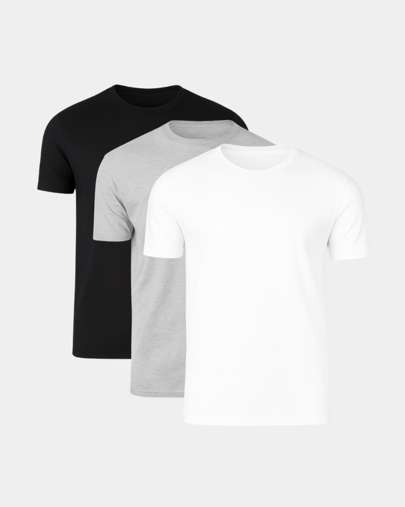 Three plain t-shirts in black, gray, and white on a light gray background #Color_mixed basics