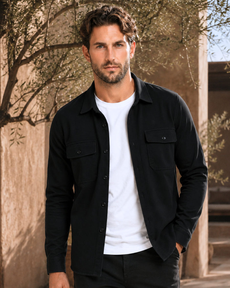 By Alden black overshirt on male model, front view upper body, outdoor warm beige background #Color_black