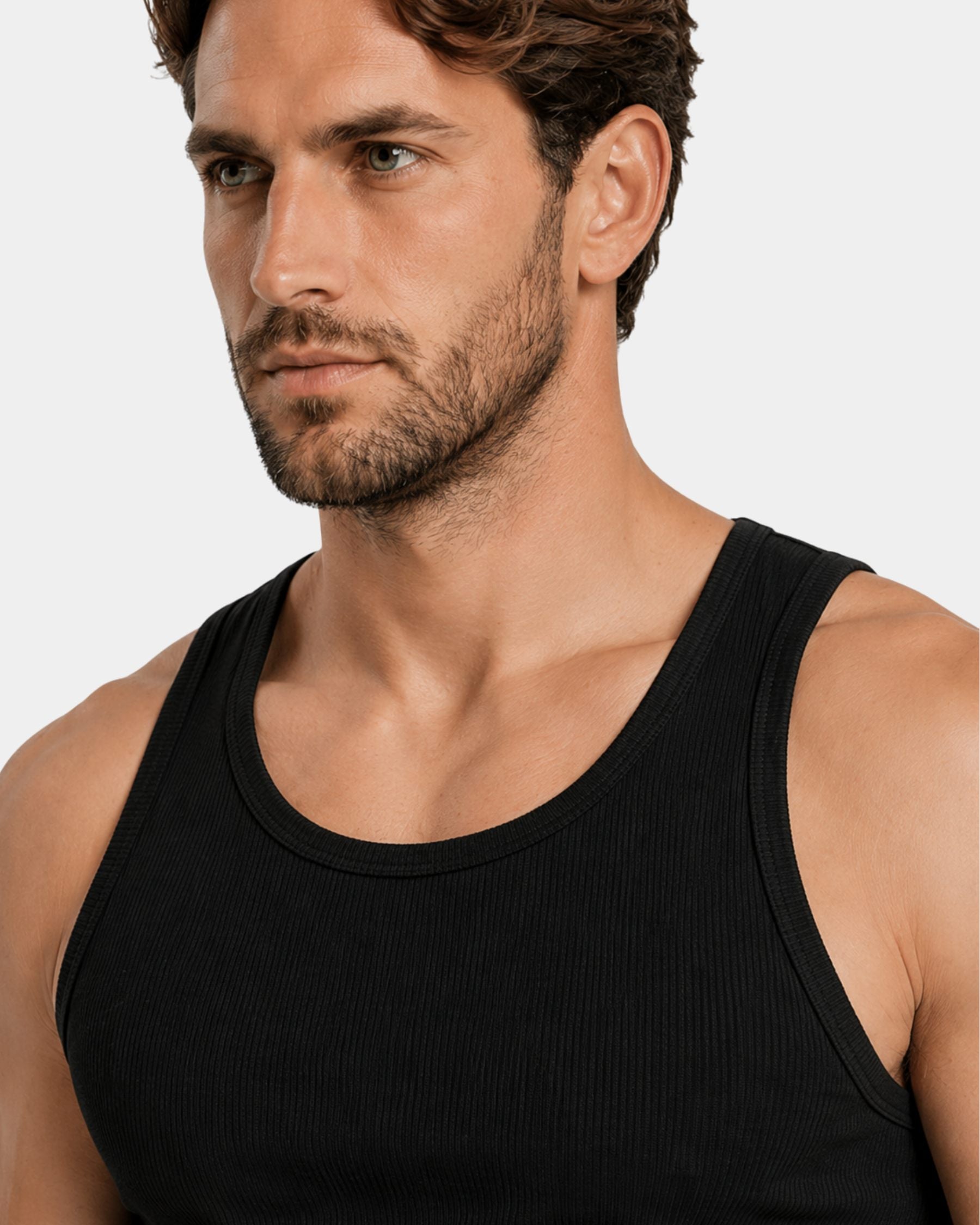 By Alden black ribbed tank top on male model, close-up detail of neckline and shoulder, light gray background #Color_black