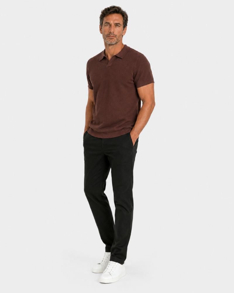 By Alden burgundy open-collar knit polo shirt on male model, three-quarter view, full body, light gray background. #color_chocolate brown