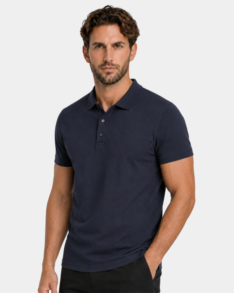 By Alden navy blue knit polo shirt on male model, three-quarter view, upper body, light gray background. #color_navy