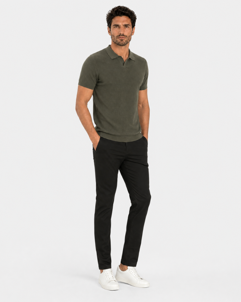 By Alden olive green open-collar knit polo shirt on male model, three-quarter view, full body, light gray background. #color_olive green