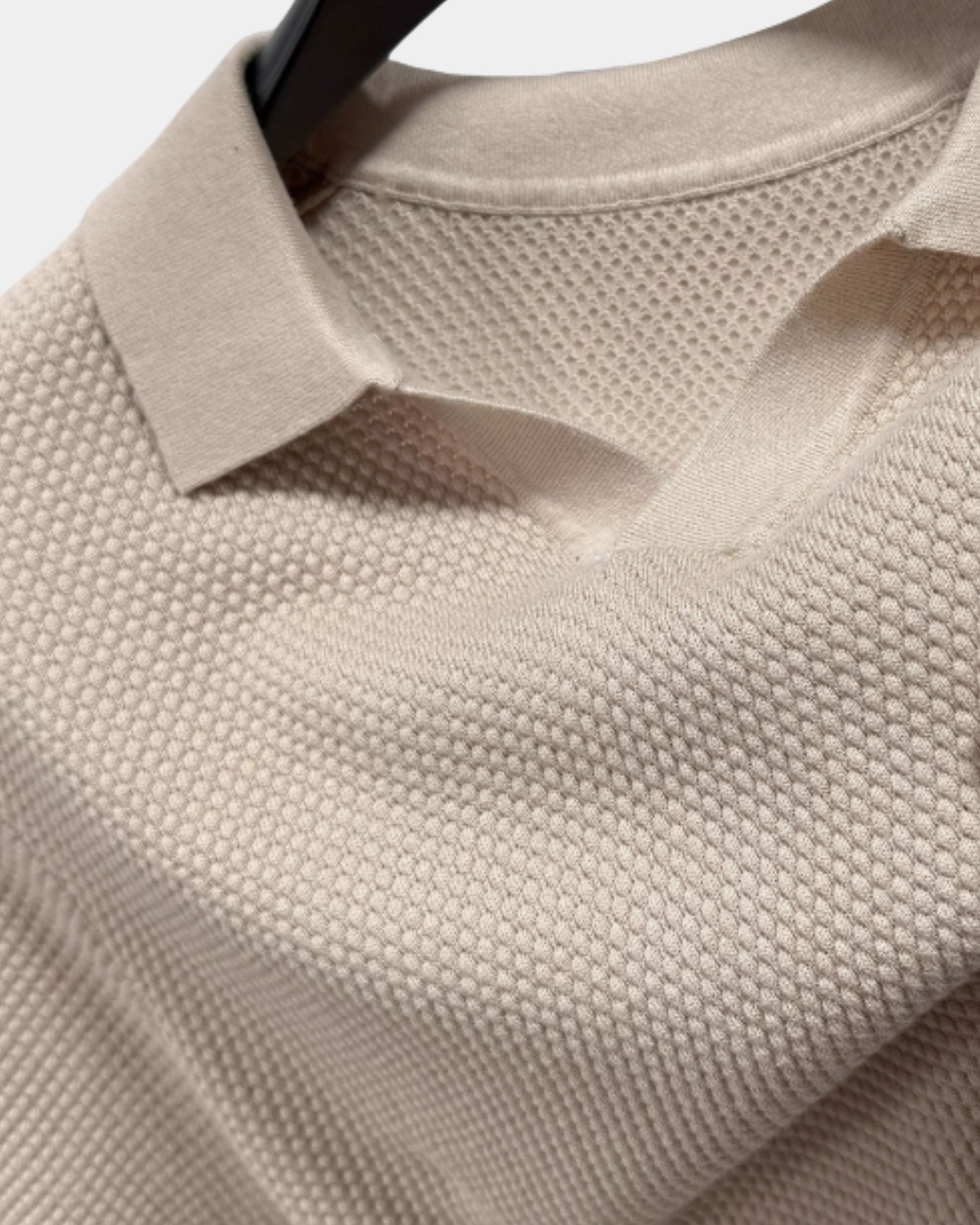 By Alden sand open-collar knit polo shirt collar and fabric texture detail, hanger, close-up, light gray background. #Color_deep stone