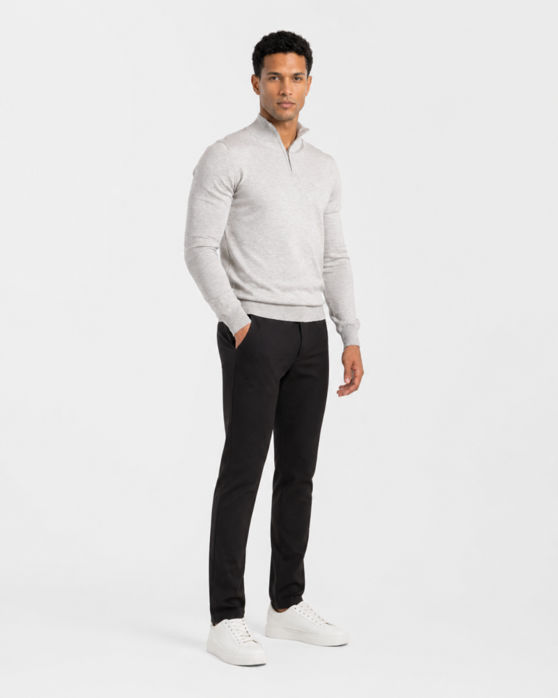 Man wearing a By Alden gray sweater and black pants on a white background #color_gray