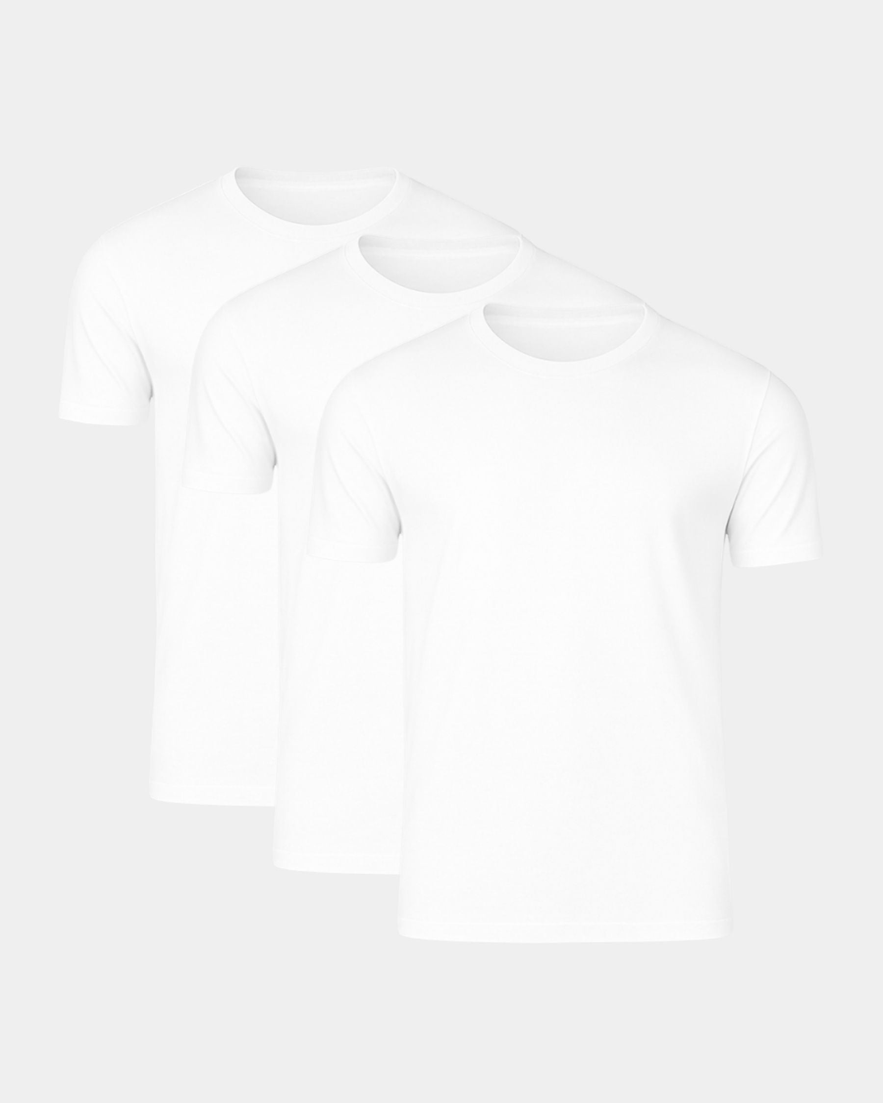 Three plain white short-sleeve crew-neck T-shirts arranged in a staggered overlapping stack on a light gray background.